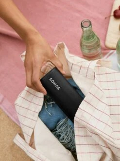 Sonos Roam Portable Speaker & Wireless Charger Set -Home Electronics Store roam lifestyle outdoor beach 79834d1b 4e21 4479 bff2 0e83462d178d